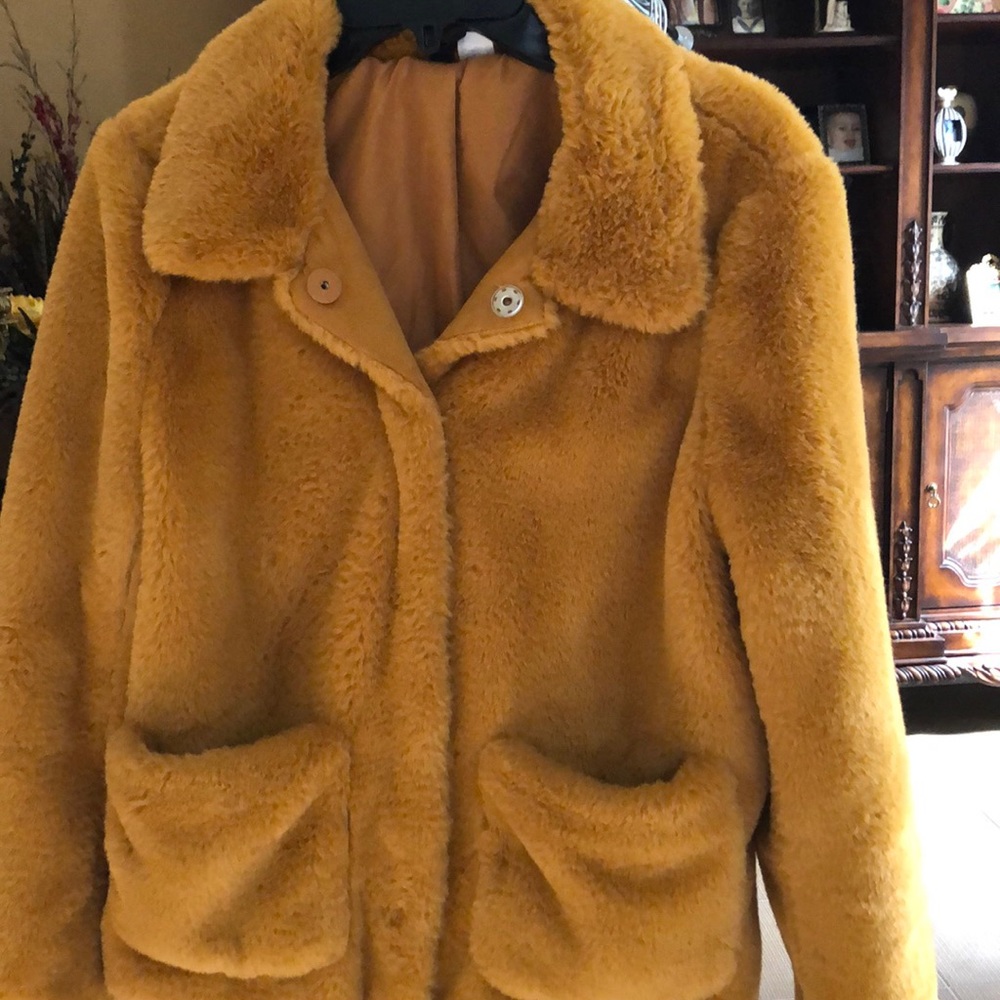 Slightly used faux fur polyester lined jacket.